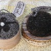 2 wooden pincushions